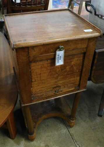 V - A late 19thC rustic tambour-fronted bedside cabinet, on turned legs, joined by an inverted under...