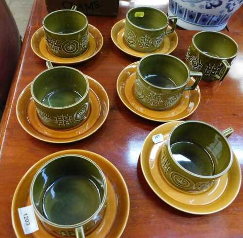 V - A Susan Williams Ellis Portmeirion Totem pattern cup and saucer set, comprising seven cups and...