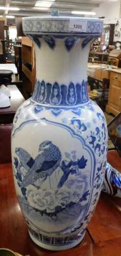 V - A 20thC Japanese porcelain freestanding blue and white vase, of shouldered form, with a repeat...