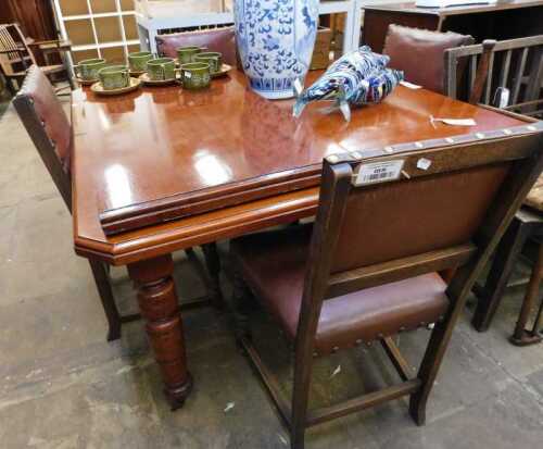 V - A dining suite, comprising a Victorian mahogany extending dining table, with canted corners, on...
