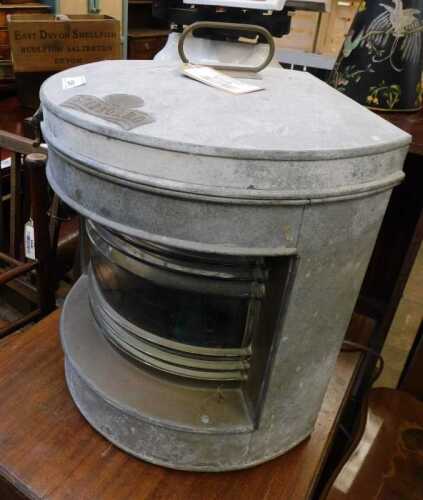 V - An early 19thC Davy & Co London starboard ship's lantern, of shaped form with arched glass front,...