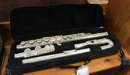 V - A 20thC JP chrome-plated four-piece flute, in fitted case, 42cm wide. NB. VAT is payable on the...