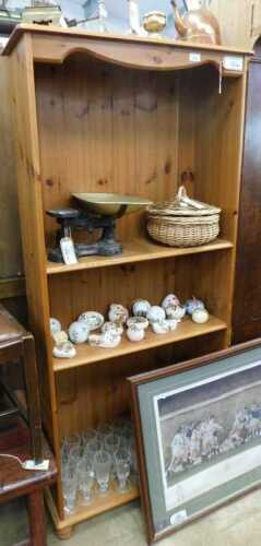 V - A 20thC pine open bookcase, of rectangular form, with adjustable shelves, 169cm high, 75cm wide,...