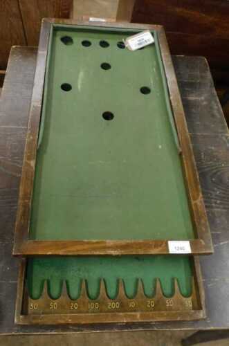 V - A vintage part bar billiards game, with stencilled numbers and scoring section, 75cm wide. NB....