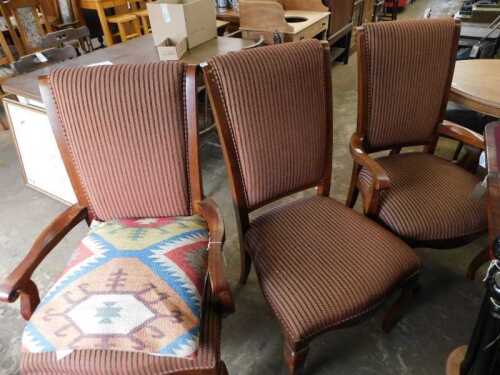 V - Two Ethan Allen upholstered carver chairs, with overstuffed backs and seats in Regency-style...
