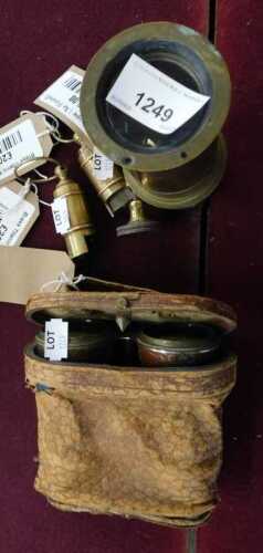 V - A late 19thC/early 20thC brass part telescope, 18cm high, a cased pair of binoculars, and two...