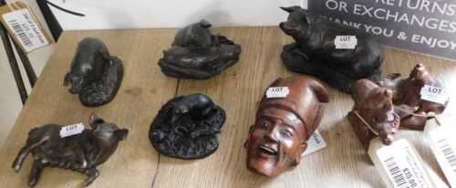 V - Various tribal masks, treen, metal pig ornaments, 11cm wide, etc. (a quantity) NB. VAT is...