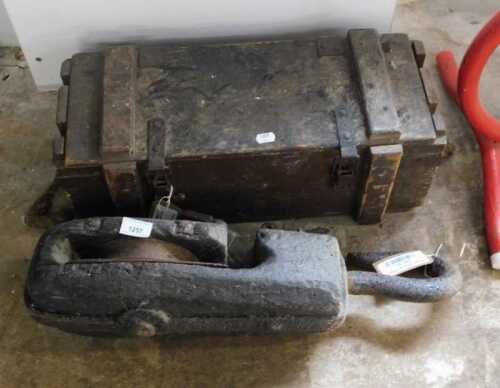 V - An early 20thC iron and wooden ship's hook block and tackle style fish hook, and an ammunition...