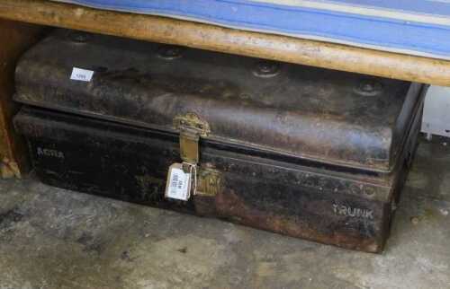 V - An early 20thC domed top tin trunk, marked ACRA, 35cm high, 66cm wide, 38cm deep. NB. VAT is...