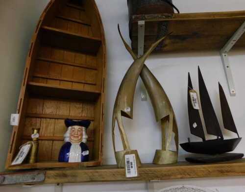 V - A hanging bookcase in the form of a ship, 79cm high, various other items, a Ross of London...