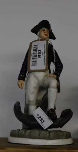V - A limited edition Michael Sutty Mid Shipment figure, number 27/250, 25cm high. NB. VAT is...