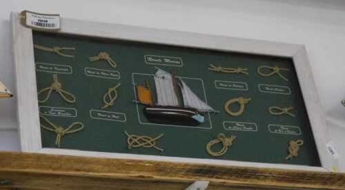V - A framed set of various ship's knots, 64cm wide. NB. VAT is payable on the hammer price. CAVEAT...