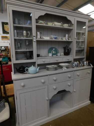 V - WITHDRAWN PRESALE BY VENDOR- A 20thC painted kitchen dresser, the upper section with three...