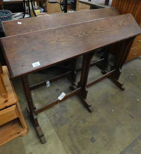 V - A 19thC pine ecclesiastical lectern, for several books, on shaped legs, 97cm high, 109cm wide,...
