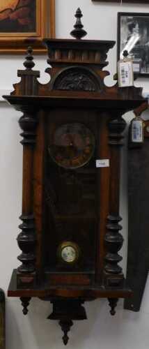 V - An early 20thC Vienna wall clock, the 13cm diameter dial in a three part glazed case, with...