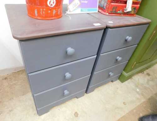 V - A pair of three drawer bedside cabinets, painted grey, 64cm high, 40cm wide, 39cm deep. NB. VAT...