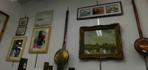 V - A 19thC copper warming pan, with turned wooden handle, 103cm high, another brass example,...