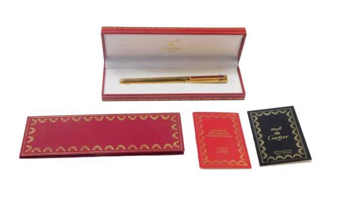 A Must de Cartier Paris Stylo Feuter felt tip pen, serial number 033070, boxed, with leather...