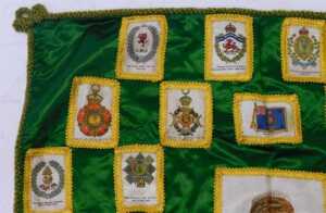 An early 20thC green silk cushion cover, decorated centrally with a silk depicting Her Majesty... - 4