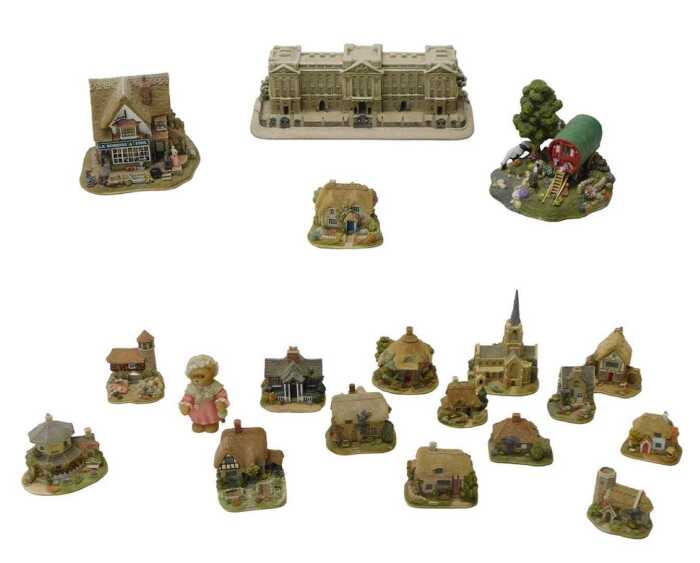A group of Lilliput Lane sculptures, to include Buckingham Palace in Winter, Toll Booth Llanfair,...