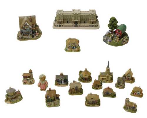 A group of Lilliput Lane sculptures, to include Buckingham Palace in Winter, Toll Booth Llanfair,...