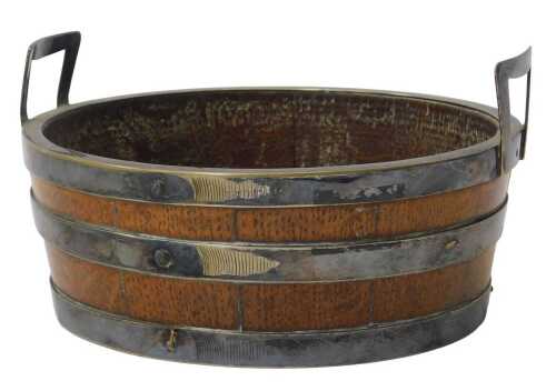A Victorian oak butter tub, with silver plated handles and strapwork, 16cm wide.