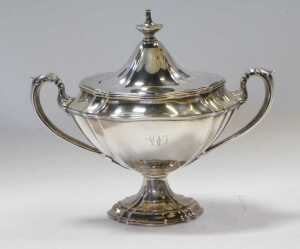 A William IV silver twin handled sugar bowl and cover, of urn form, initialled, raised on a... - 2