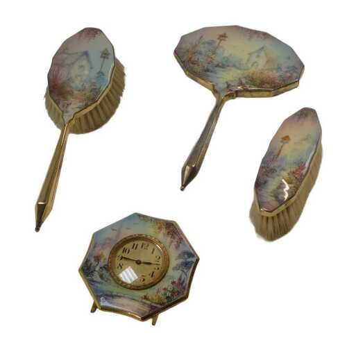 A mid 20thC hand painted enamelled dressing table set, comprising a hairbrush, hand mirror,...