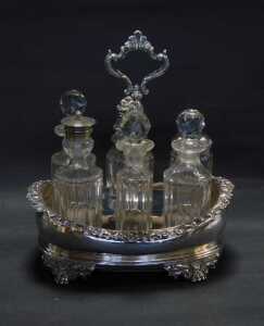 A George IV and later silver cruet stand, of oval form, the border decorated with scrolls and... - 3