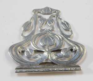 A Victorian silver backed hand mirror, embossed with flower head and scrolling motifs, with a... - 5