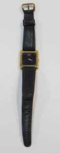 A Jaeger-LeCoultre lady's wristwatch, with a rectangular and black faced dial, in a gold plated... - 2