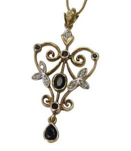 A 9ct gold pendant and chain, the scroll work pendant set with a sapphire and a diamond, of... - 2
