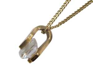 A 9ct gold pendant and chain, the pendant set with a square cut imitation diamond, with a swirl... - 2