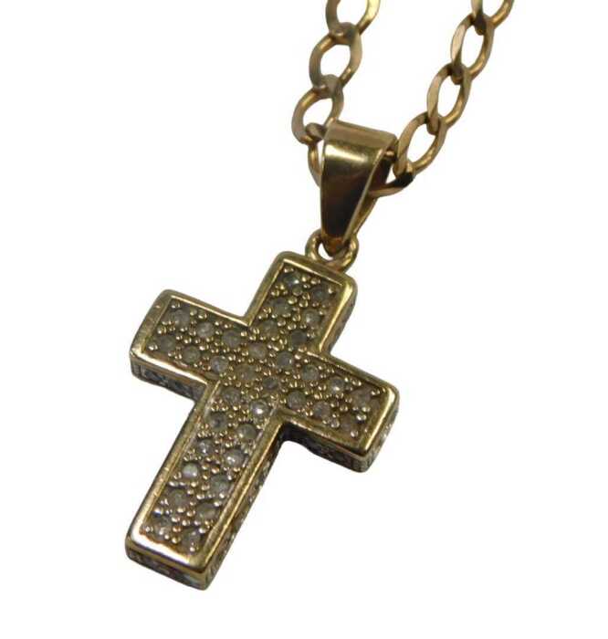 A cross pendant and chain, the gem encrusted cross, with arched pendant mount, 3cm high, on a...