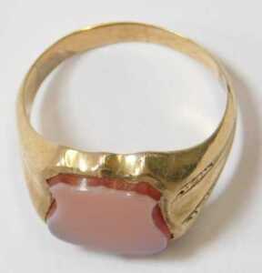 A gent's signet ring, set with a sardonyx, on a yellow metal coloured band, unmarked, showing... - 2