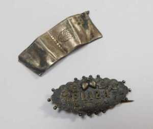 A group of white metal mounts, walking canes, cheroots, bottle tops, and an enamel butterfly... - 3