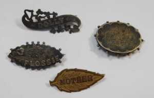 A group of costume brooches, mainly period examples, to include gilt metal, memorial, crested,... - 2