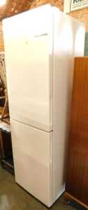 A Bosch fridge/freezer, white, 182cm high, 55cm wide, 56cm deep.
