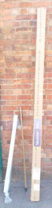 Two window blinds, one boxed, from Blinds 2 Go, one in cellophane wrapper, and a wooden pole,...
