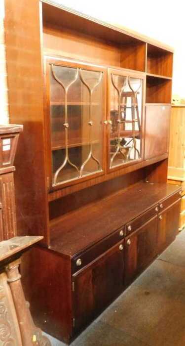 A mahogany veneered display cabinet, with two glazed doors and drop down shelf, various shelves...