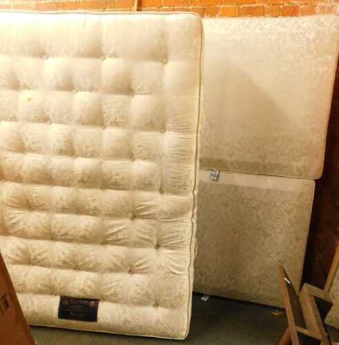 A double divan bed, comprising a pocket spring Millbrook mattress, a divan base with drawers.