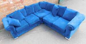 A contemporary blue draylon upholstered L shaped sofa, raised on chromed supports, 226cm x 222cm. - 2