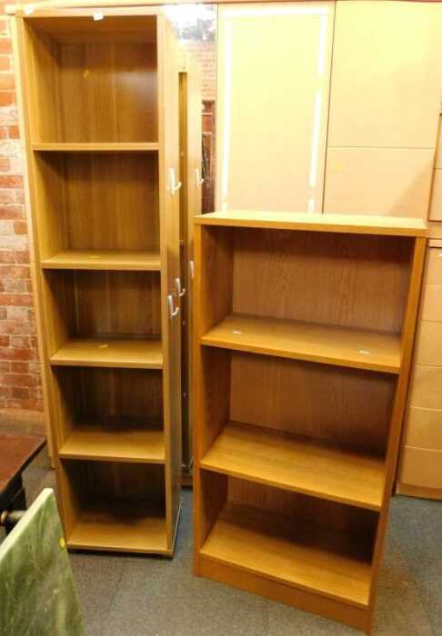 Two bookcases, one with five shelves, one with three shelves, finished in wood effect.