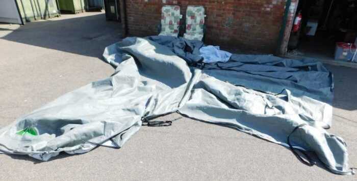 A caravan cover, to suit a four berth fixed bed single axle caravan, in bag, and two foldable...