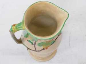 A Carltonware relief moulded jug, decorated with an oak tree with acorns, against a buff ground,... - 3