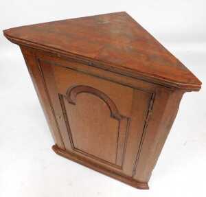 A George III oak hanging corner cabinet, the top with a moulded edge above a hanging door... - 2