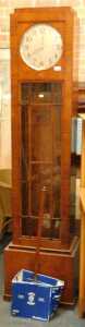 A 1920s walnut cased longcase clock, the circular silvered dial with Arabic numerals, with...