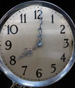 A 1920s walnut cased longcase clock, the circular silvered dial with Arabic numerals, with... - 2