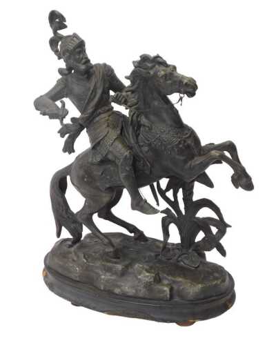 A 19thC spelter figure, modelled as an armoured figure on rearing horseback, raised on an...
