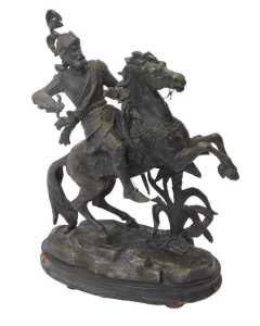A 19thC spelter figure, modelled as an armoured figure on rearing horseback, raised on an...